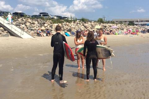 Sophie and field technician Trina Lafata surveying surfers at the Ogunquit River Mouth Beach in Ogunquit, Maine.