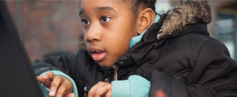 Child engaged with technology